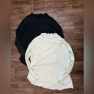 (2) We The Free Long Sleeve Swoosh Tops